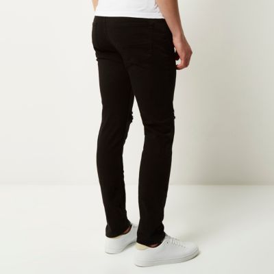 Black ripped Sid cropped skinny jeans